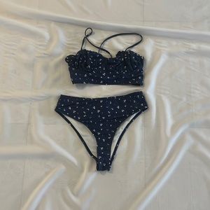 Blue swimsuit with pink flowers